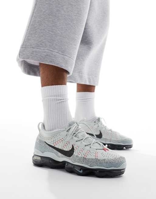 Nike Air Vapormax 2023 Flyknit trainers in silver and red