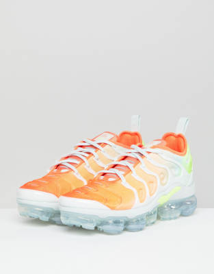grey and orange vapormax plus