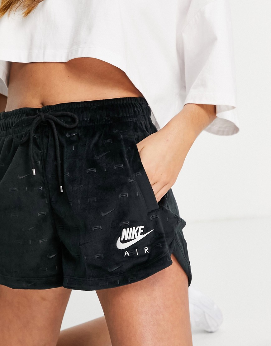 Nike Air velour shorts in black with all over swoosh