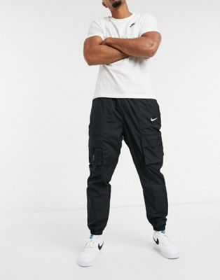 Nike Air woven cuffed joggers in black 