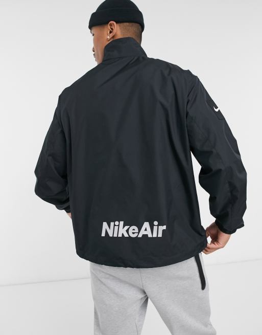 tiburón Marca comercial flor Nike Air woven overhead windbreaker jacket in black | ASOS