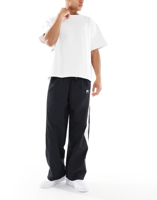 Nike Air woven paneled pants in black and white | ASOS