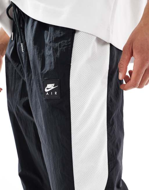 Nike Air woven paneled pants in black and white