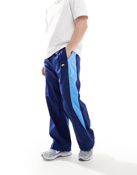 Nike Air woven paneled pants in navy and blue - view 1