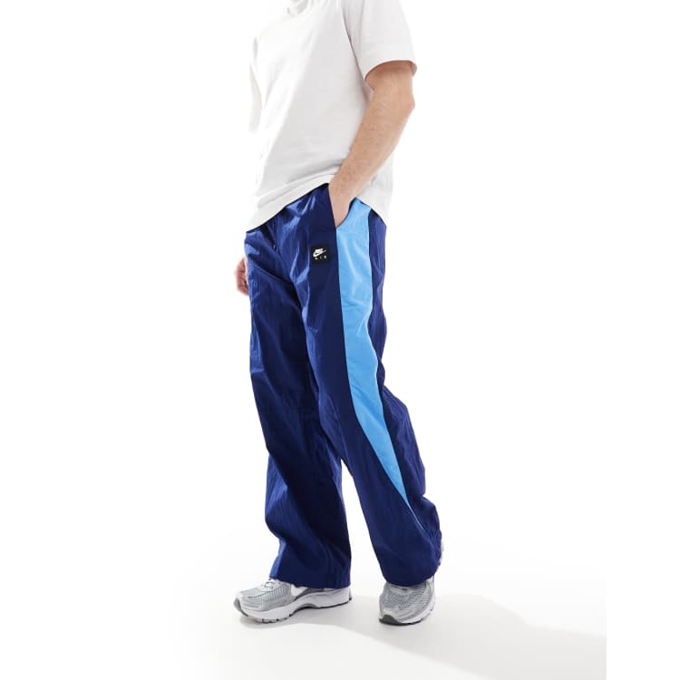 ★★Nike★★ Air Woven Pants M Blue Void University Blue Bla Nike Air woven paneled pants in navy and blue | ASOS