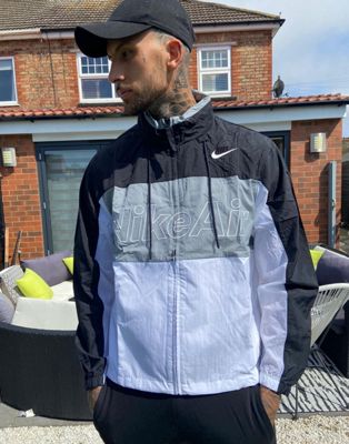 nike air woven track jacket