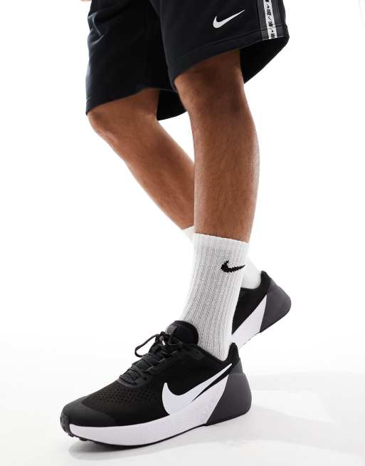 Nike Air Zoom sneakers in black and white, 4 of 5