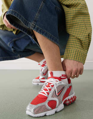 Nike Shox TL sneakers in silver and pink