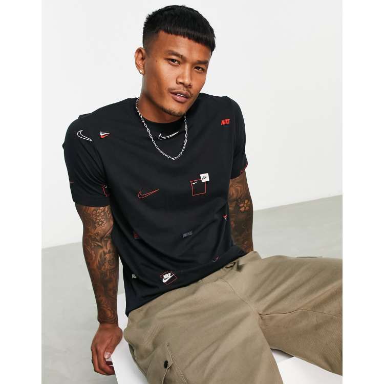 Nike all over store print shirt