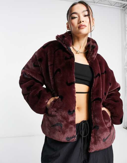 Nike all over swoosh faux fur jacket in burgundy crush and black