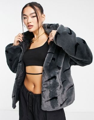 Nike all over swoosh faux fur jacket in smoke grey and black