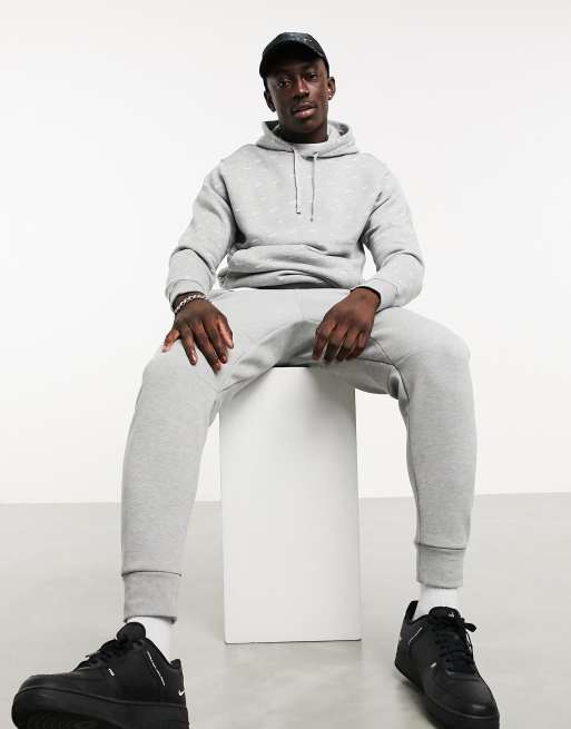 Nike all over swoosh best sale hoodie grey