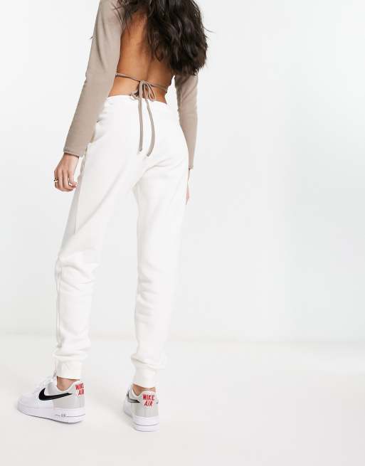 Nike animal print logo sweatpants in white