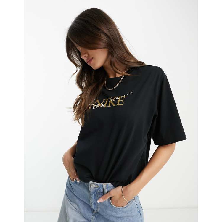 Women black and gold best sale nike shirt