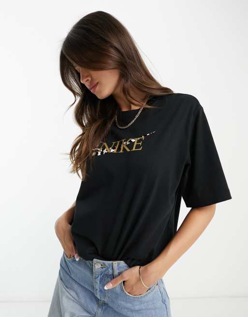 Nike animal print logo t shirt in black ASOS