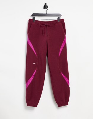 Nike Archive Fleece Sweatpants With Ripstop Panels In Burgundy red ModeSens