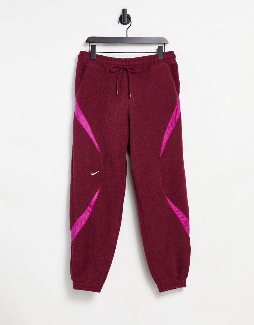 Nike Archive fleece sweatpants with ripstop panels in burgundy-Red