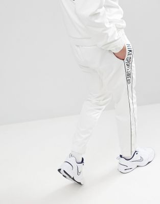 nike archive joggers with popper in white