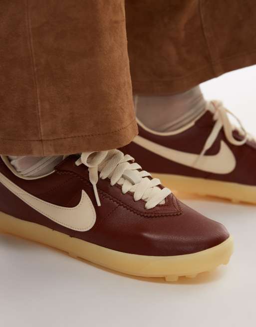 Nike Astrograbber sneakers in brown