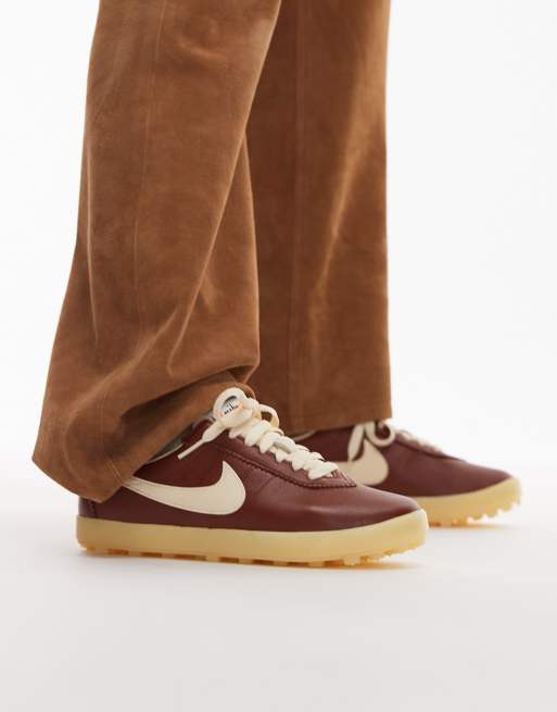 Nike Astrograbber sneakers in brown