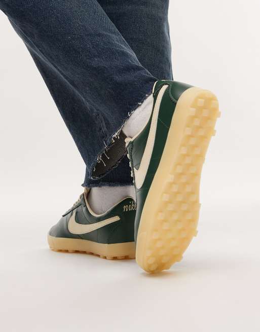 Nike Astrograbber sneakers in green | ASOS