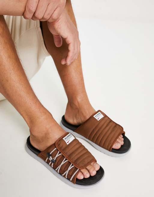 Nike Asuna slides in pecan and black ASOS