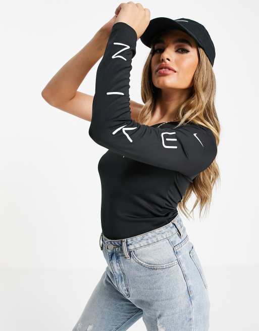 Nike asymmetric long sleeve top in black ASOS