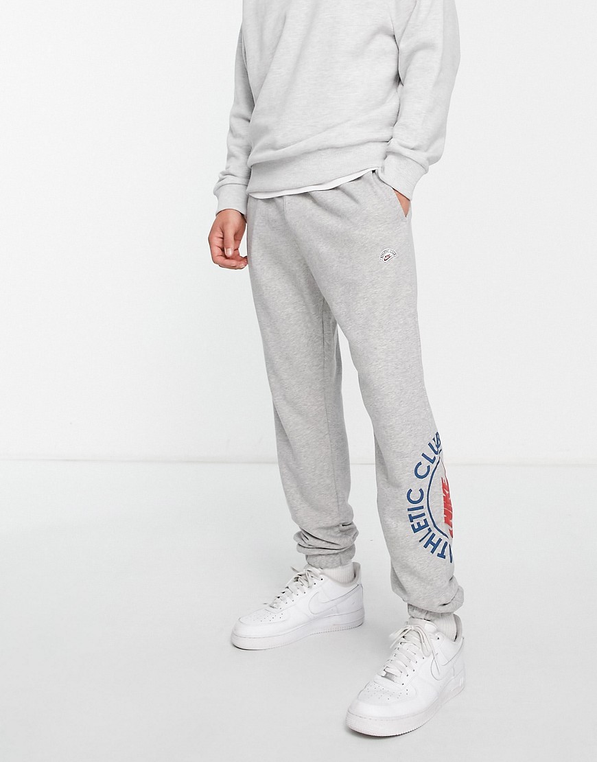 Nike Athletic Club retro logo casual fit cuffed sweatpants in gray heather - gray