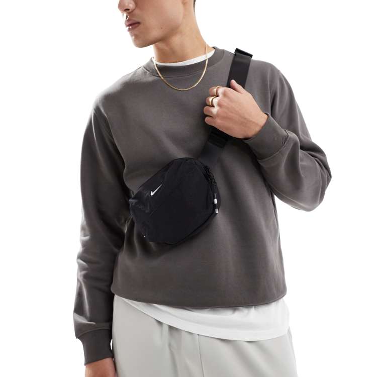 Nike Aura belt bag in black ASOS