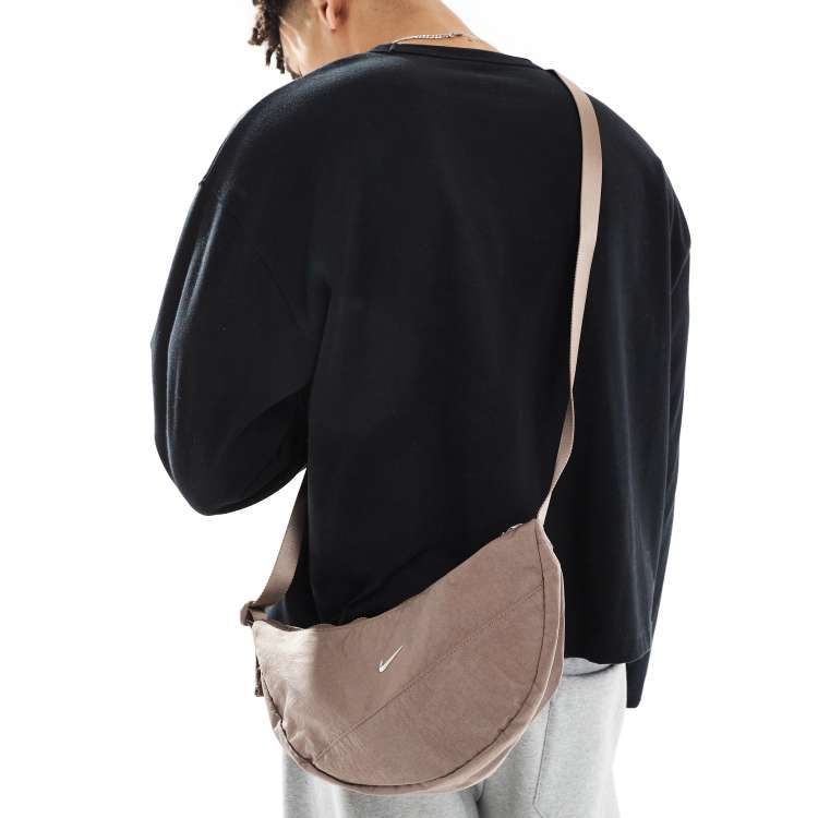 Nike Aura Crescent crossbody bag in brown | ASOS
