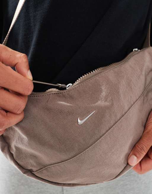 Nike Aura Crescent crossbody bag in brown | ASOS