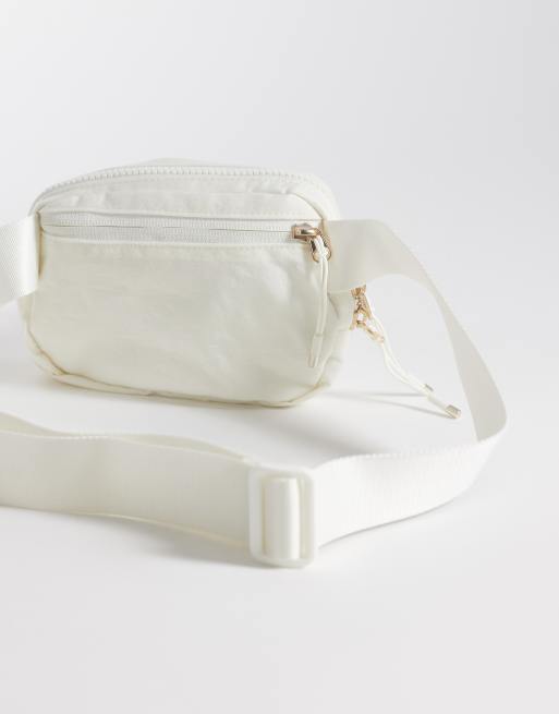 Nike Aura crossbody bag in off white | ASOS