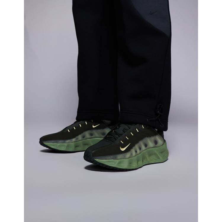 Nike Ava Rover reflective trainers in dark green and yellow