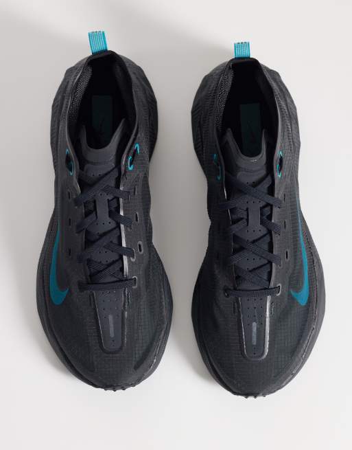 Nike Ava X trainers in black and blue, 3 of 5