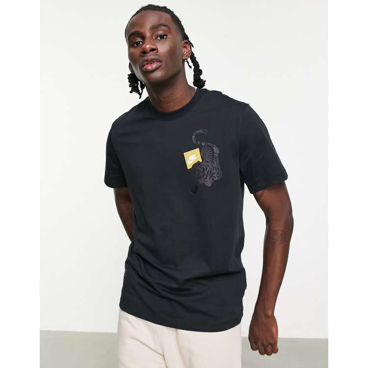 Black nike store shirt with gold