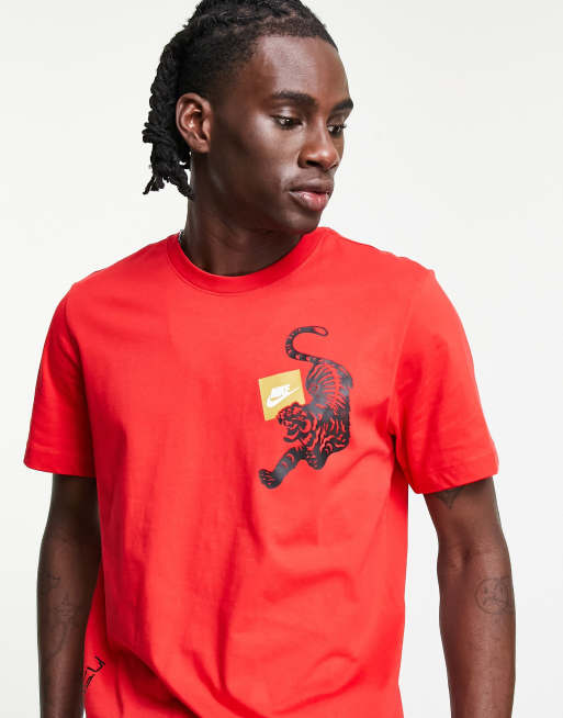 Red gold nike store shirt