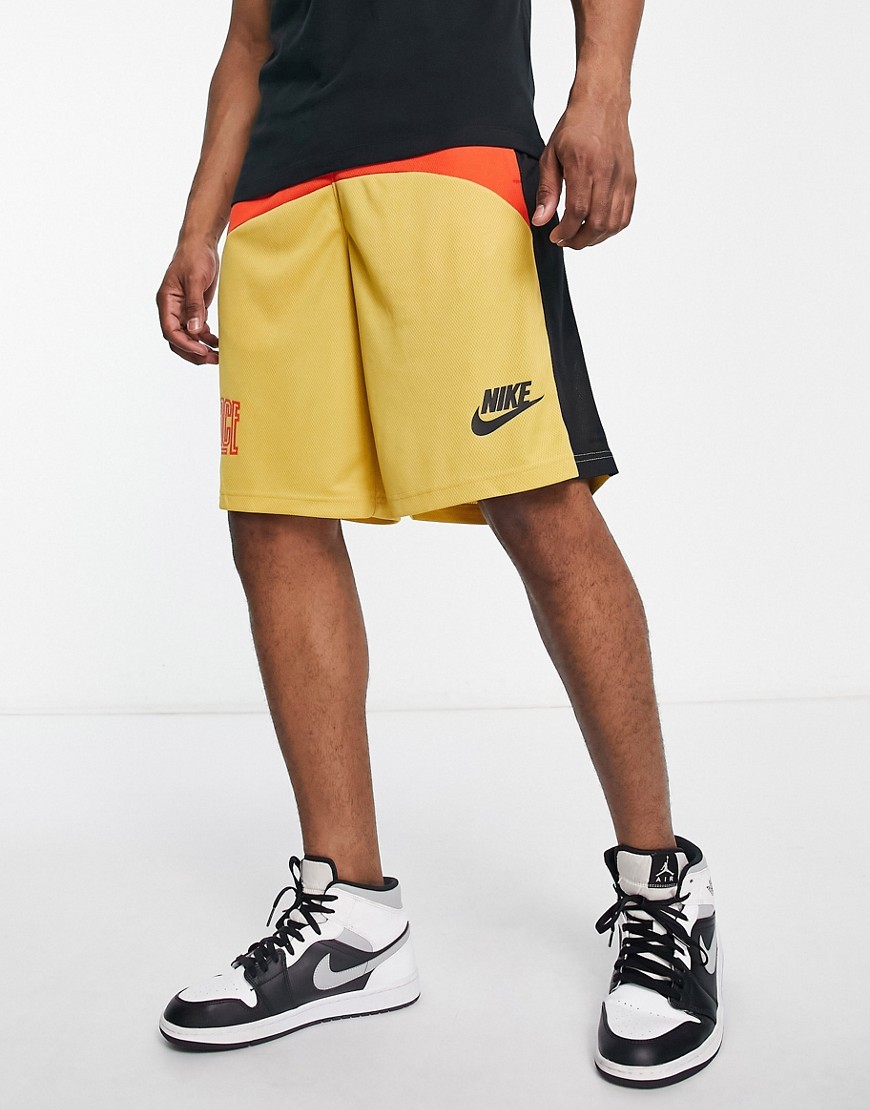 Nike Basketball 11in logo shorts in gold