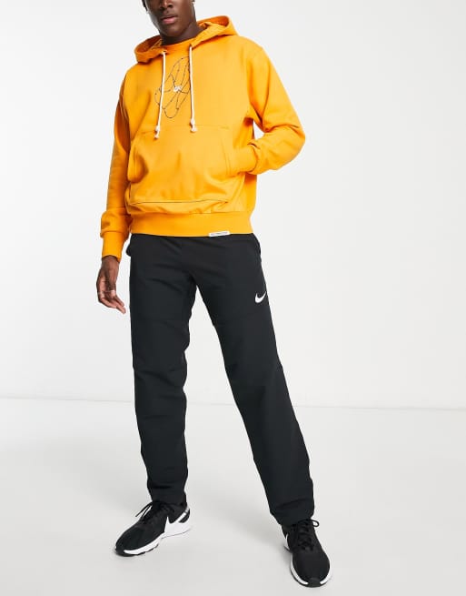 Nike Basketball Dri FIT printed hoodie in yellow