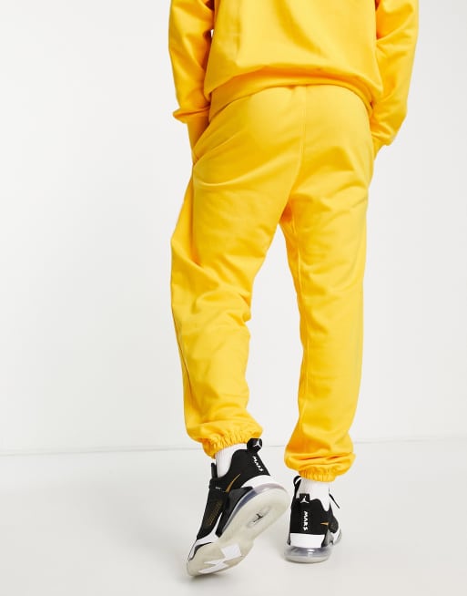 Nike 2024 yellow sweatpants