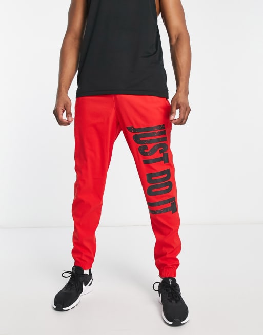 Nike red best sale track pants