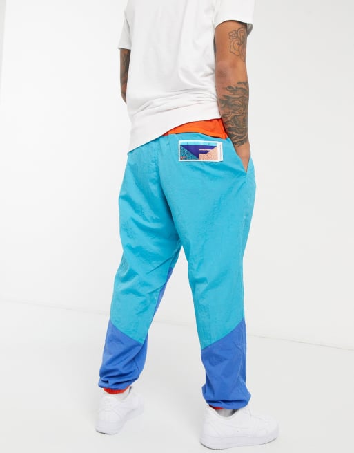 Nike Basketball flight track pants in retro colorblock blue