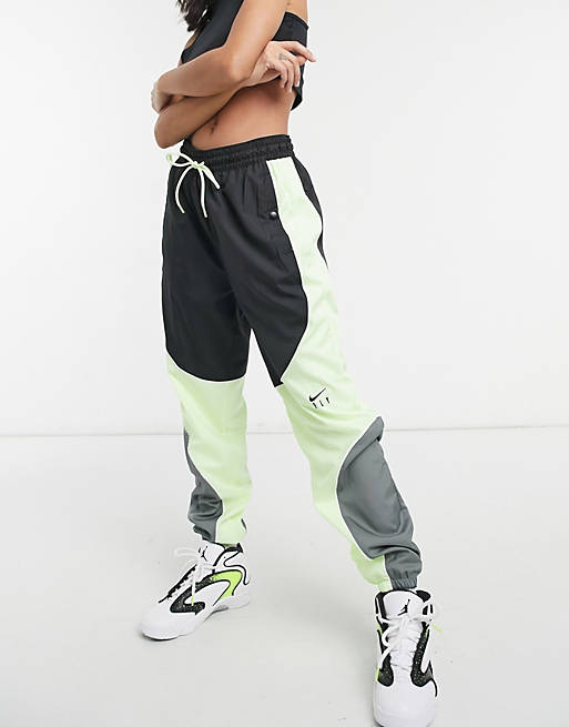 Women Nike Basketball fly joggers in grey and green 