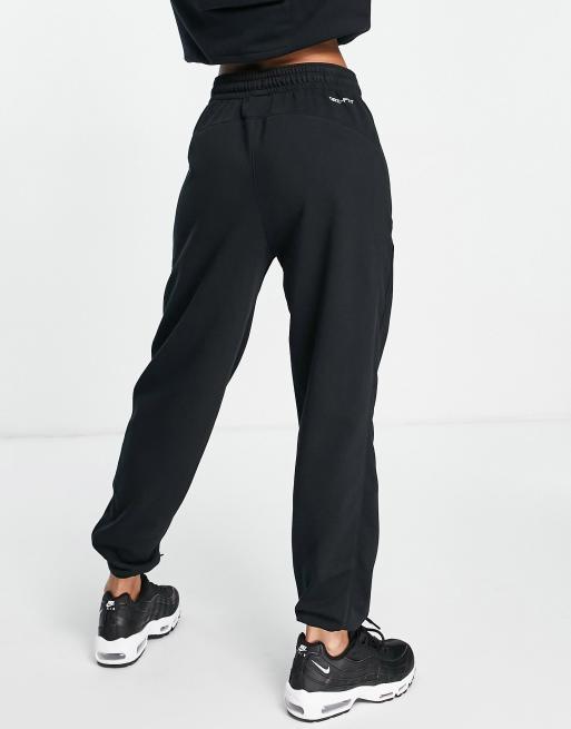 Nike Essentials Plush high-rise cuffed fleece sweatpants in bronze