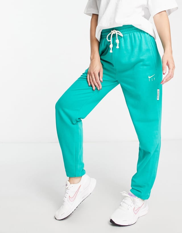 Nike Basketball Fly Standard Issue sweatpants in green - MGREEN