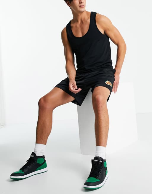 ASOS DESIGN oversized basketball shorts in black sporty mesh