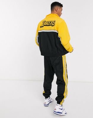 black and yellow nike tracksuit