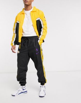 yellow and black nike jumpsuit