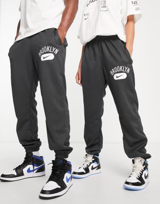 Nike Basketball NBA Brooklyn Nets Spotlight Dri-FIT unisex joggers in near black - ASOS Price Checker