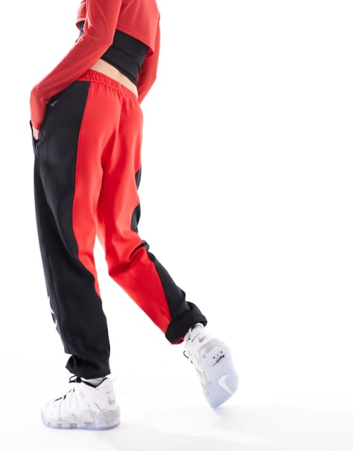 Nike Basketball NBA Unisex Chicargo Bulls Dri-FIT joggers in red and black