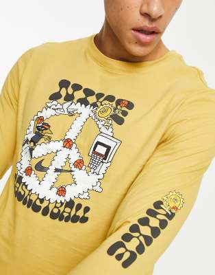 Nike Basketball peace logo long sleeve printed t-shirt in gold